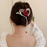 FENG.Y RED FLOWER HEART SHAPE  BANANA HAIR CLIP WITH PEARL & CHERRY BALL TASSEL